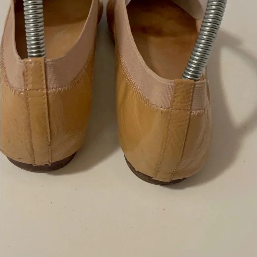 Tory burch tan color patent letter flat shoes